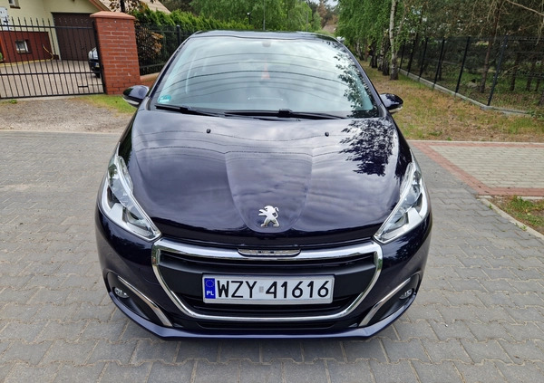 Peugeot 208 cena 28900 przebieg: 101000, rok produkcji 2016 z Łochów małe 326